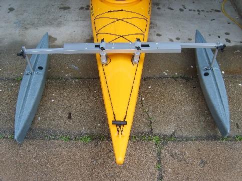 Above: Kayak stabilizer with gray HD floats. Yellow, red and mango ...
