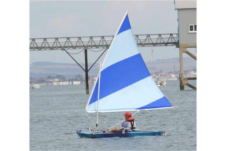 dark blue sailboat